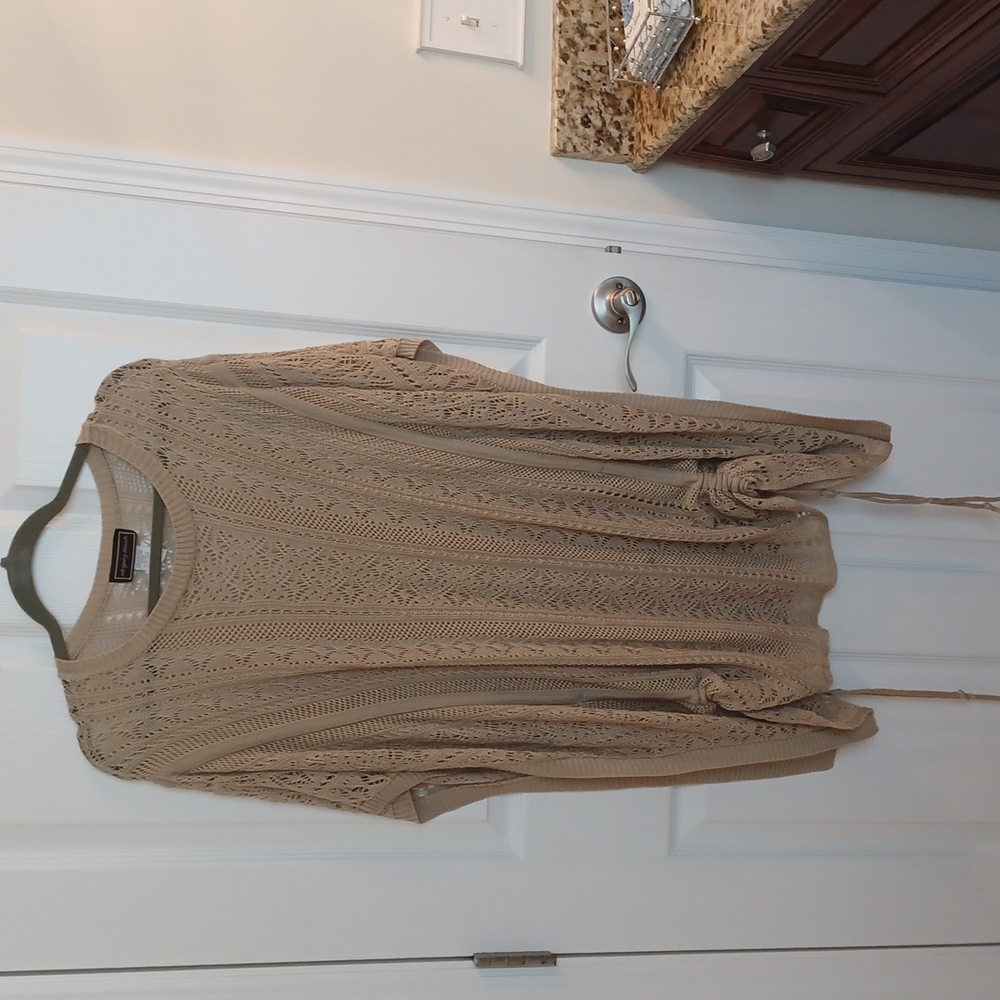 Tan open work sweater. Size L/XL.